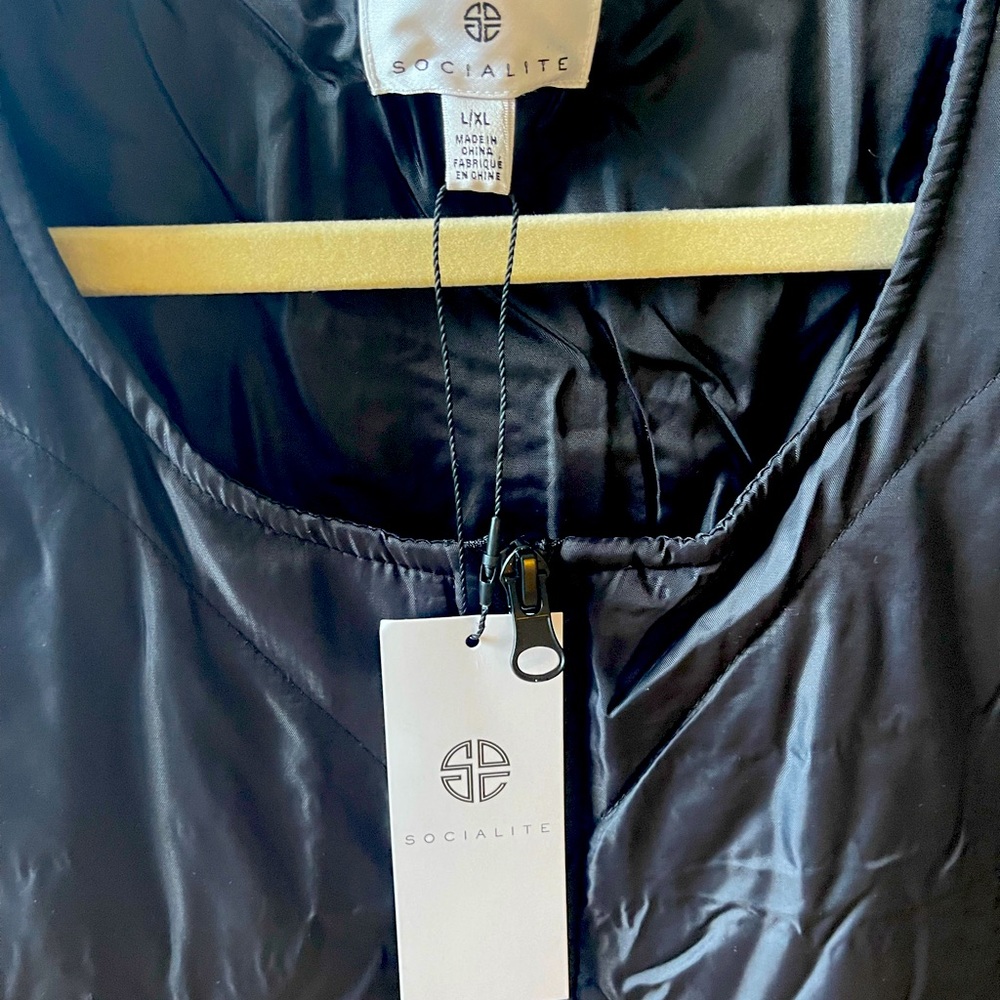 Brand new *socialite* vest!